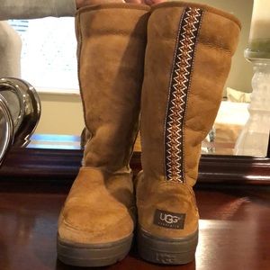Camel colored uggs with design. Size 8 Wide